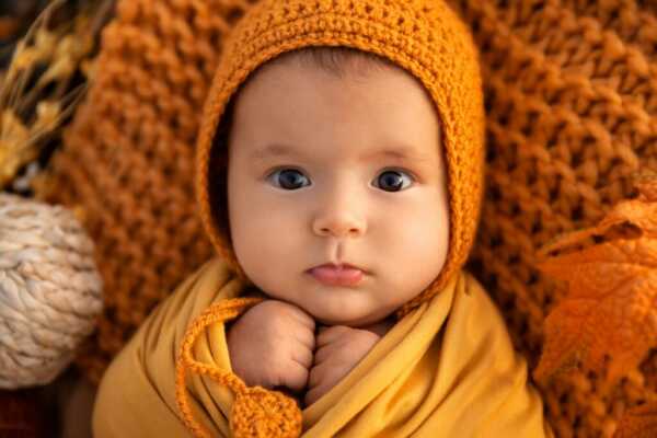 When to stop swaddling your baby