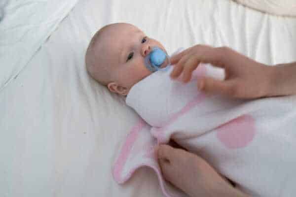 Receiving Blanket Vs. Swaddling Blanket: Choosing The Right Blanket For Your New Baby 1 Receiving blanket vs. Swaddling blanket